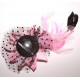 Fleur à cheveux et plumes rose clair