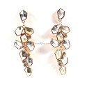 Boucles d'oreilles fantaisie longue grappe en relief et strass or