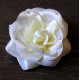 Fleur à cheveux satinée et strass jaune