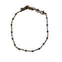 Chaîne de cheville argentée petites boules noires