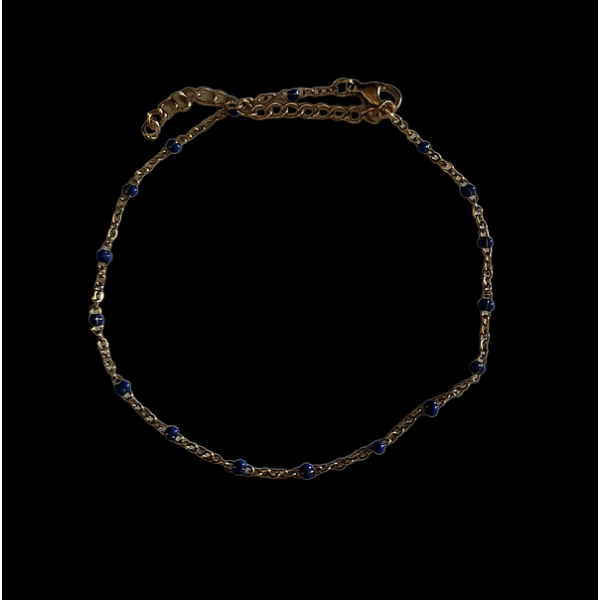 Chaîne de cheville dorée à perles bleu marine