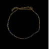 Chaîne de cheville dorée à perles bleu marine