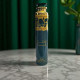 spray dubai lattafa qimmah poser sur une table en marbre