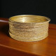 Lot de bracelets indiens dorés pailletés en métal léger