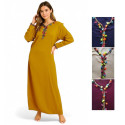Djellaba femme unie décor pompons colorés 