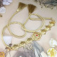 Ceinture plaqué or femme avec pierres rouges et cordon doré à pompons