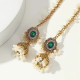 Bijou d’oreille oriental avec chaîne capillaire