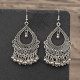 Bijoux orientaux argentés style indien avec motifs ciselés
