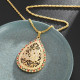 pendentif goutte orné de strass et motif religieux islamique