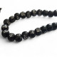 Tasbih noir avec incrustation argenté