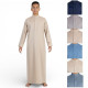 Qamis enfant manches longues crème, style traditionnel avec col montant et poche sur le buste