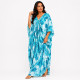 Djellaba femme coupe papillon imprimée turquoise portée avec tombé fluide