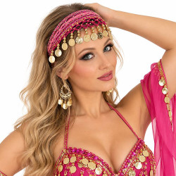 Serre tête filet de danse orientale fuschia porté par une danseuse