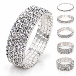 Bracelet strass argenté fantaisie extensible, disponible en plusieurs largeurs, avec rangées de strass brillants.