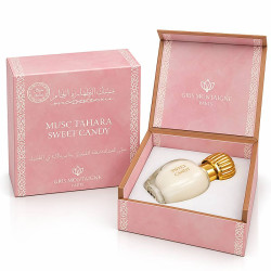 Musc Tahara Sweet Candy Gris Montaigne 12 ml, flacon nacré au bouchon doré dans son coffret rose clair légèrement marbré