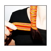 Enroulement du kardoune autour des longueurs des cheveux